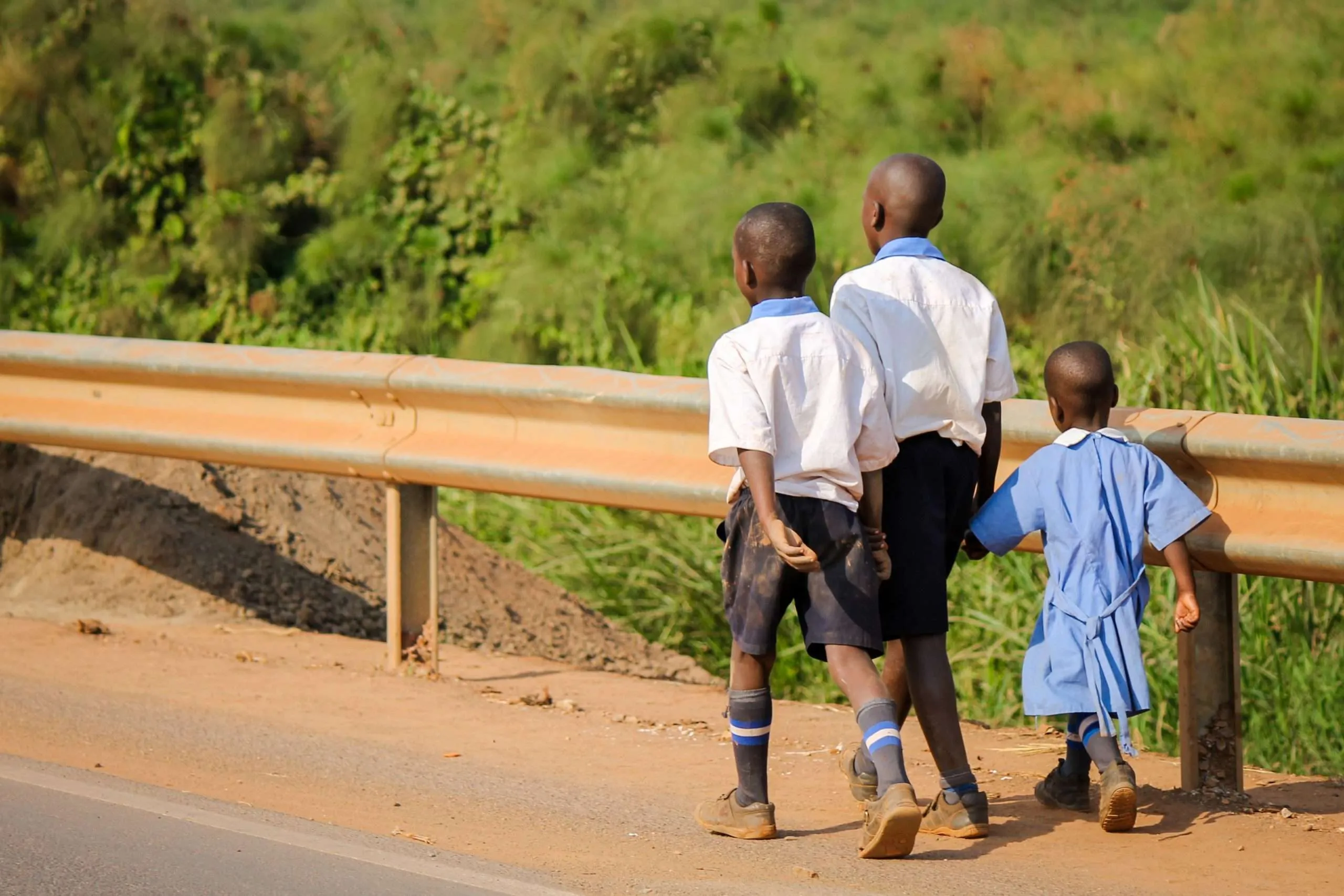 Children walking in Uganda